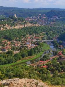 an aerial view of a town and a river at Гергана in Veliko Tŭrnovo