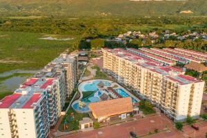 Bazén v ubytování Hermoso apartamento, con la comodidad de tu hogar! nebo v jeho okolí