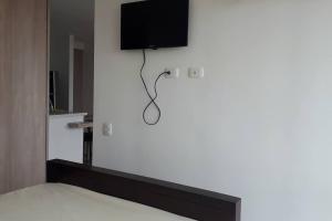 TV a/nebo společenská místnost v ubytování Hermoso apartamento, con la comodidad de tu hogar!