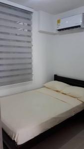 Postel nebo postele na pokoji v ubytování Hermoso apartamento, con la comodidad de tu hogar!