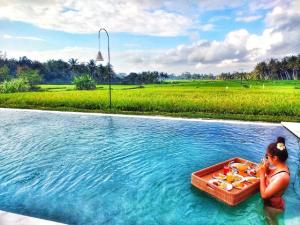 Champaca Luxury Villas Ubud内部或周边的泳池
