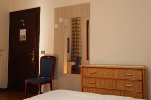 Letto o letti in una camera di b&b Wu Giada