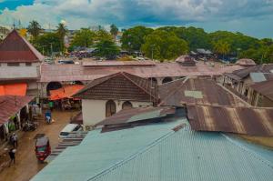 an overhead view of a village with a train station at Rafiki Apartment in Zanzibar City