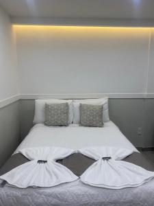 Postel nebo postele na pokoji v ubytování Hotel Caiçara
