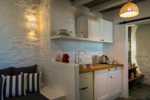 Η κουζίνα ή μικρή κουζίνα στο Maris Private Residence