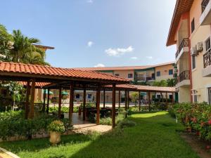 a view of the courtyard of a building at Vilamar Suítes in Aquiraz