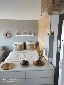 Postel nebo postele na pokoji v ubytování appartement belle vue