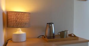 Coffee and tea making facilities at Elegante bilocale a pochi passi dal mare