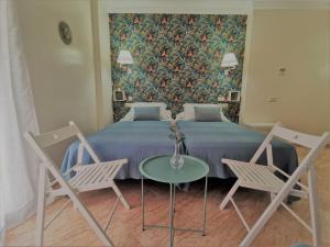 Ein Bett oder Betten in einem Zimmer der Unterkunft Hotel Playa del Carmen