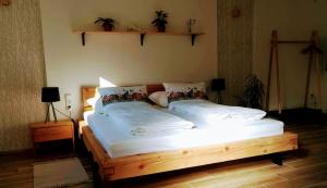 Postel nebo postele na pokoji v ubytování Apartmány Cechovní
