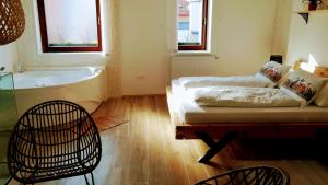 Postel nebo postele na pokoji v ubytování Apartmány Cechovní