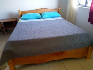 Postel nebo postele na pokoji v ubytování ROOMS fronte lago
