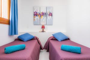 Posteľ alebo postele v izbe v ubytovaní Casa Caty con piscina,a 5 minutos de la Playa