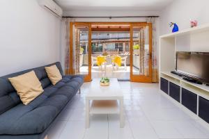 Posedenie v ubytovaní Casa Caty con piscina,a 5 minutos de la Playa