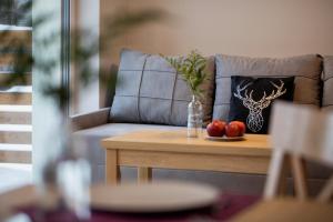 Et opholdsområde på Osada Wróblonki - Apartamenty
