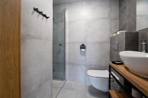 Et badeværelse på Osada Wróblonki - Apartamenty