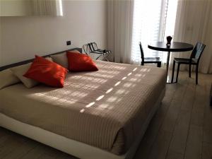 
Ein Bett oder Betten in einem Zimmer der Unterkunft Blue Shades ApartHotel
