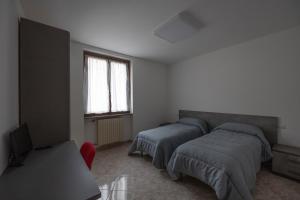 Posteľ alebo postele v izbe v ubytovaní Placido's B&B