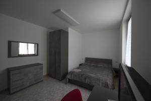 Posteľ alebo postele v izbe v ubytovaní Placido's B&B