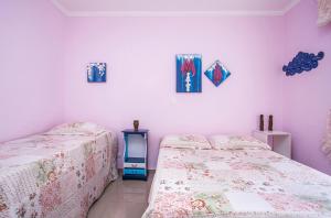 Llit o llits en una habitació de Apartamento Águas de Lindoia