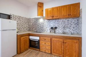 Kuchnia lub aneks kuchenny w obiekcie Karin House