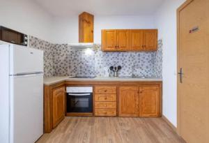 Kuchnia lub aneks kuchenny w obiekcie Karin House