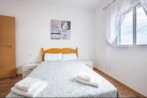Łóżko lub łóżka w pokoju w obiekcie Karin House