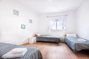 Postel nebo postele na pokoji v ubytování Karin House