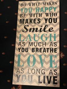 a poster with the words love on a black background at Bru Na Pairc B&B in Bantry