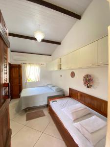 Ένα ή περισσότερα κρεβάτια σε δωμάτιο στο Sitio das Amélias