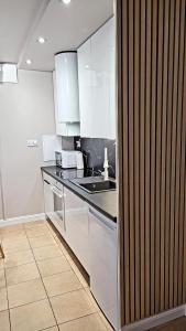 Kuchyňa alebo kuchynka v ubytovaní APARTAMENT25b, plaża, internet, NETFLIX