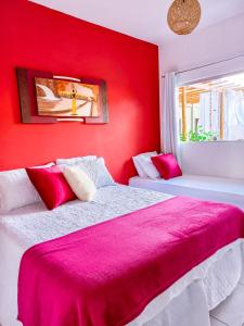 Łóżko lub łóżka w pokoju w obiekcie Pousada Primavera