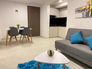 TV a/nebo společenská místnost v ubytování Apartamento Nuevo Excelente Ubicación Ibague