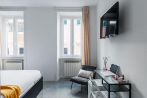 A television and/or entertainment centre at The Venue Spagna
