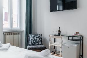 A bed or beds in a room at The Venue Spagna