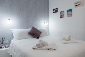 A bed or beds in a room at The Venue Spagna