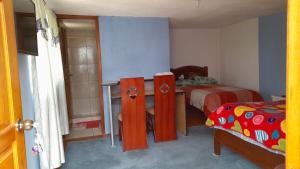 Letto o letti in una camera di Hospedaje el Motilon