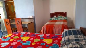 Letto o letti in una camera di Hospedaje el Motilon