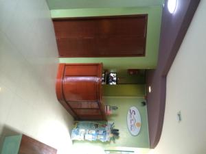 an overhead view of a kitchen with cabinets at Shore Time Hotel - Annex in Boracay