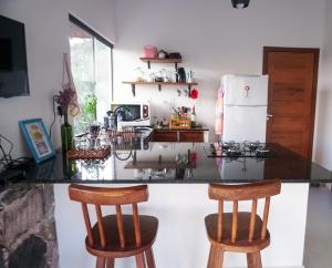 Kuchyň nebo kuchyňský kout v ubytování Casa dos Sonhos