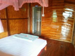 Giường trong phòng chung tại Tran Xuan Homestay