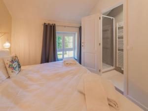 Ein Bett oder Betten in einem Zimmer der Unterkunft Remouchamps Ecolodge Retreat