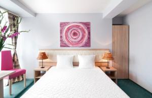 Posteľ alebo postele v izbe v ubytovaní Hotel Petrus