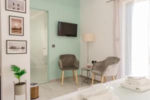 TV a/nebo společenská místnost v ubytování Island Apartments