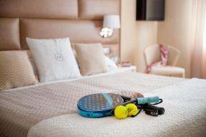 A bed or beds in a room at Hotel Mediterraneo