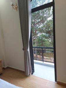 Giường trong phòng chung tại Gia An - hotel in Dalat