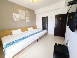Postelja oz. postelje v sobi nastanitve New Summer Homestay