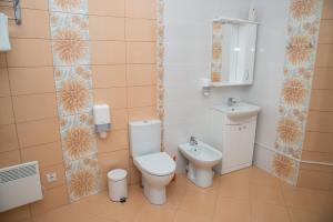 Koupelna v ubytování 12 Months Mini Hotel