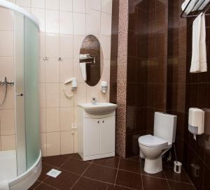 Koupelna v ubytování 12 Months Mini Hotel