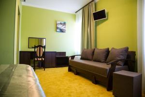 TV a/nebo společenská místnost v ubytování 12 Months Mini Hotel